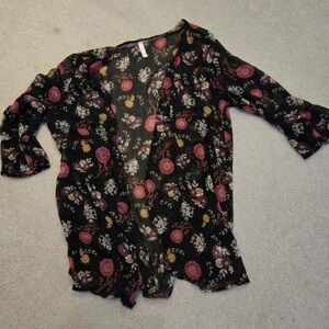 Hit the pool in this beautiful sheer floral cover up!